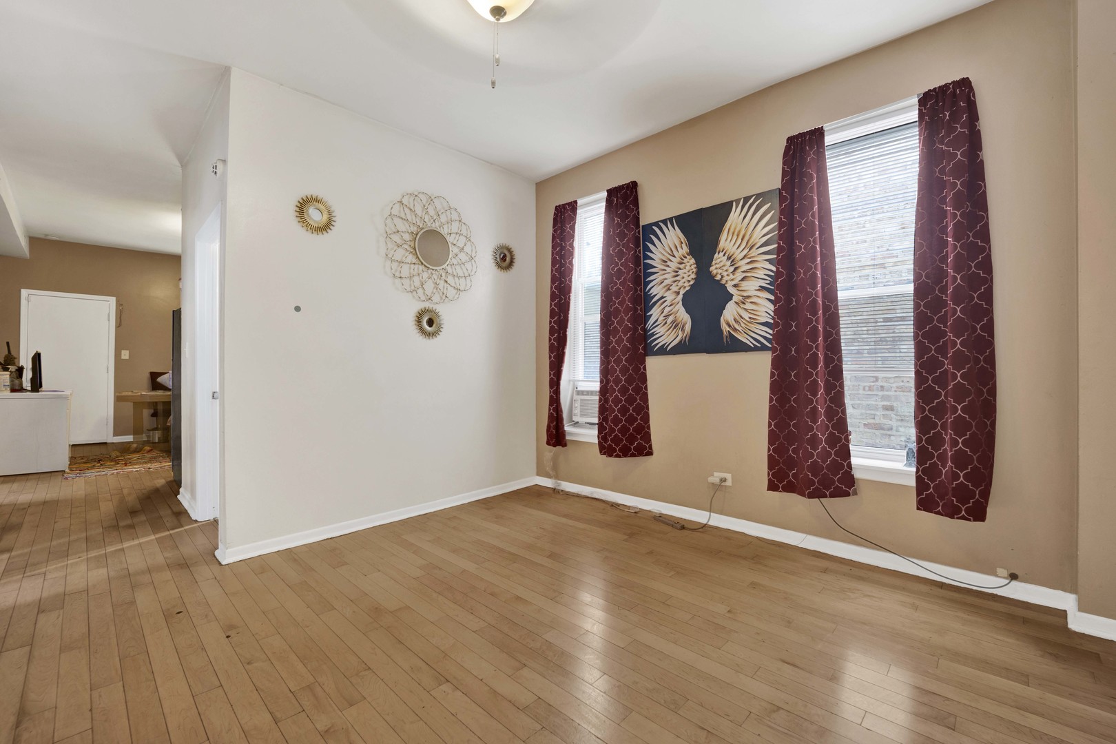 3326 West Crystal Street Chicago, IL 60651 - Photo 4 of 16 an empty room with windows and closet