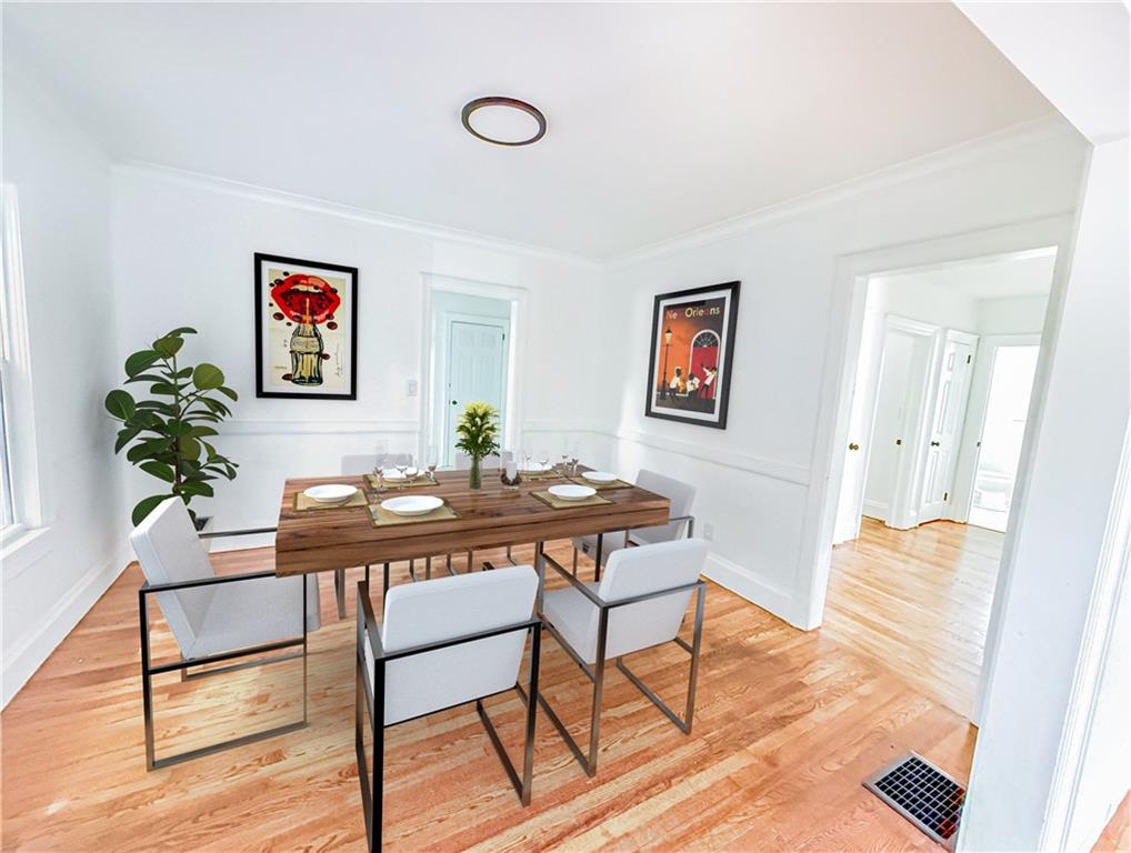 1679 Altadena Place Southwest Atlanta, GA 30311 - Photo 3 of 10 a view of a livingroom with furniture and wooden floor