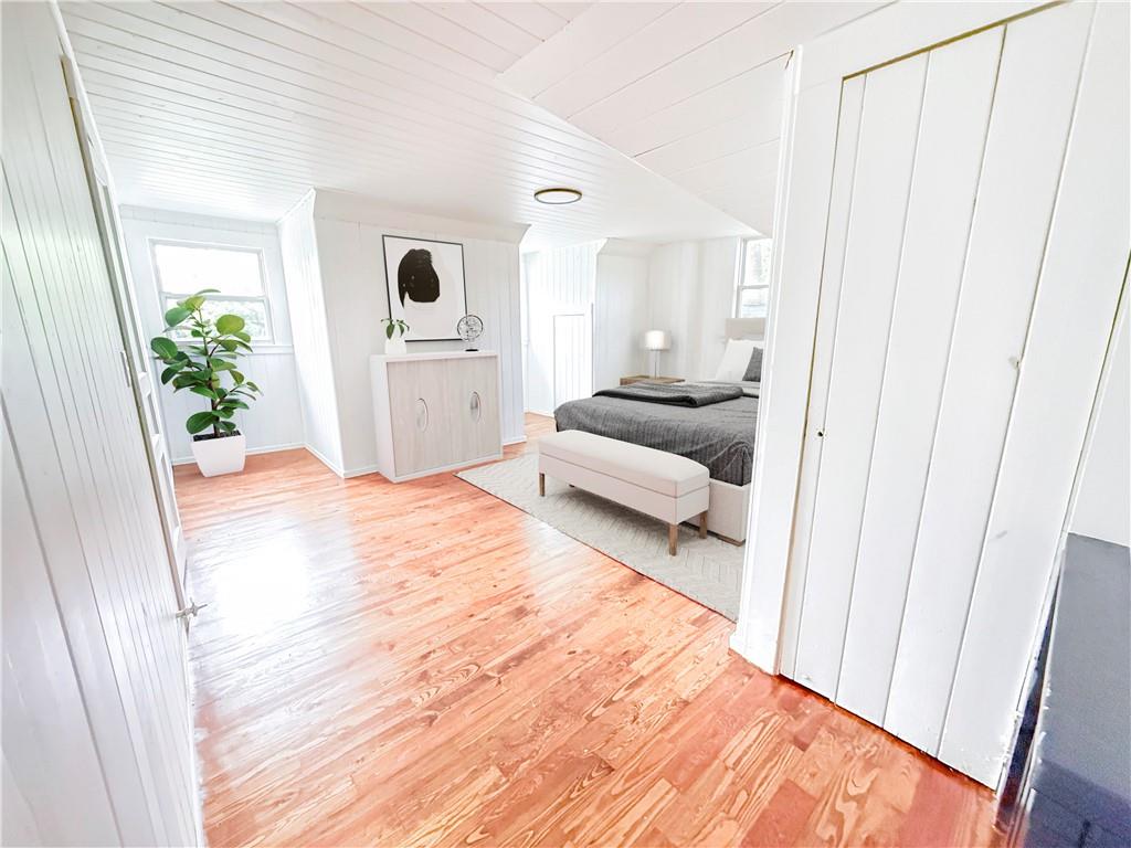 1679 Altadena Place Southwest Atlanta, GA 30311 - Photo 7 of 10 a bedroom with a bed and a window