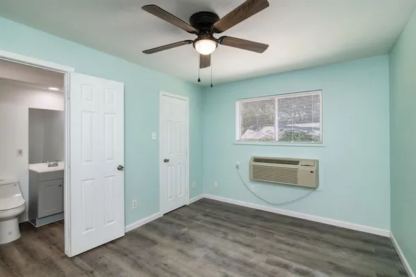 a view of an empty room and window