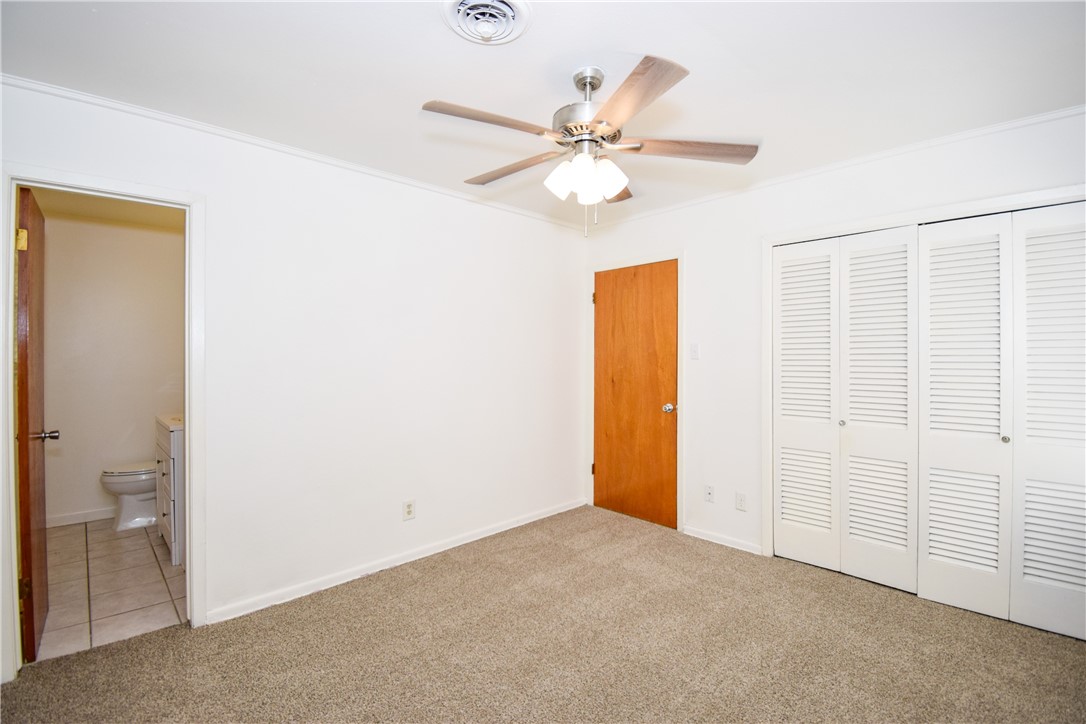 1209 Dallas Street Portland, TX 78374 - Photo 16 of 29 a view of a livingroom with a chandelier fan