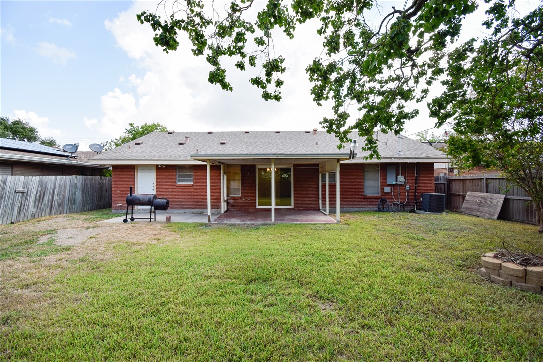1209 Dallas Street Portland, TX 78374 - Photo 29 of 29 a view of a house with a yard and sitting area