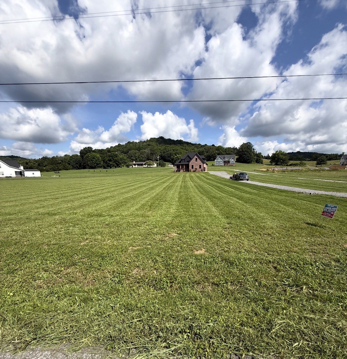 6595 Greenvale Road Watertown, TN 37184 - Photo 5 of 47 a view of a big room with a big yard