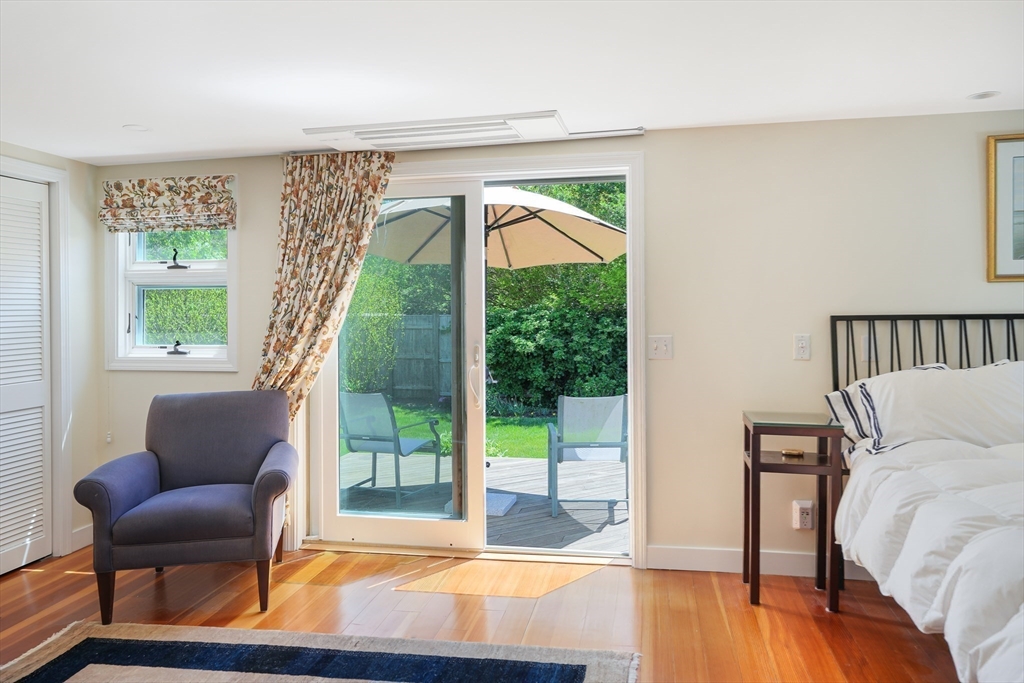 28 Crocker Drive Edgartown, MA 02539 - Photo 12 of 24 a living room with furniture and a large window
