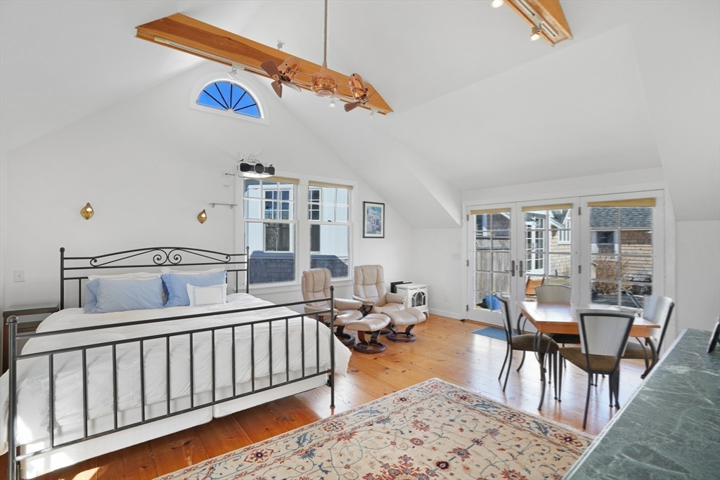 28 Crocker Drive Edgartown, MA 02539 - Photo 19 of 24 a living room with furniture and a table