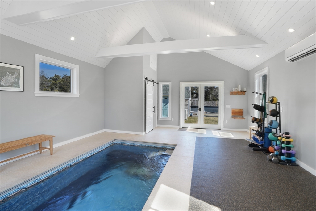 28 Crocker Drive Edgartown, MA 02539 - Photo 22 of 24 a view of livingroom with hardwood floor and a ceiling fan