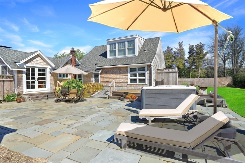 28 Crocker Drive Edgartown, MA 02539 - Photo 24 of 24 a view of a house with backyard and sitting area