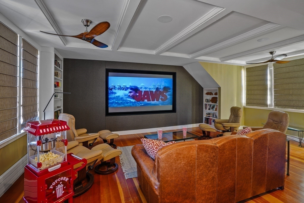 28 Crocker Drive Edgartown, MA 02539 - Photo 6 of 24 a bed room with furniture and a flat screen tv