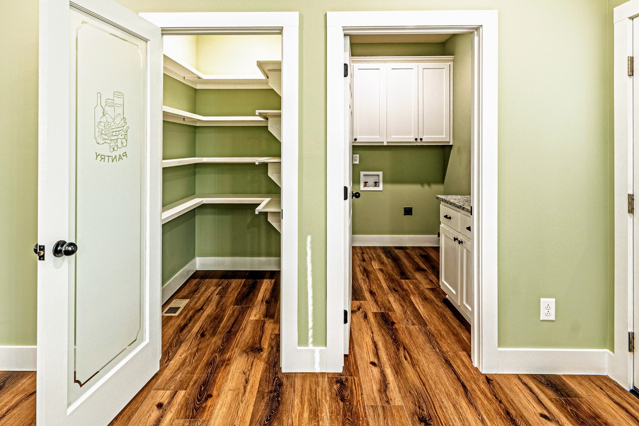 1875 Rocky Hollow Road Erin, TN 37061 - Photo 8 of 31 a view of a bedroom with wooden floor and closet