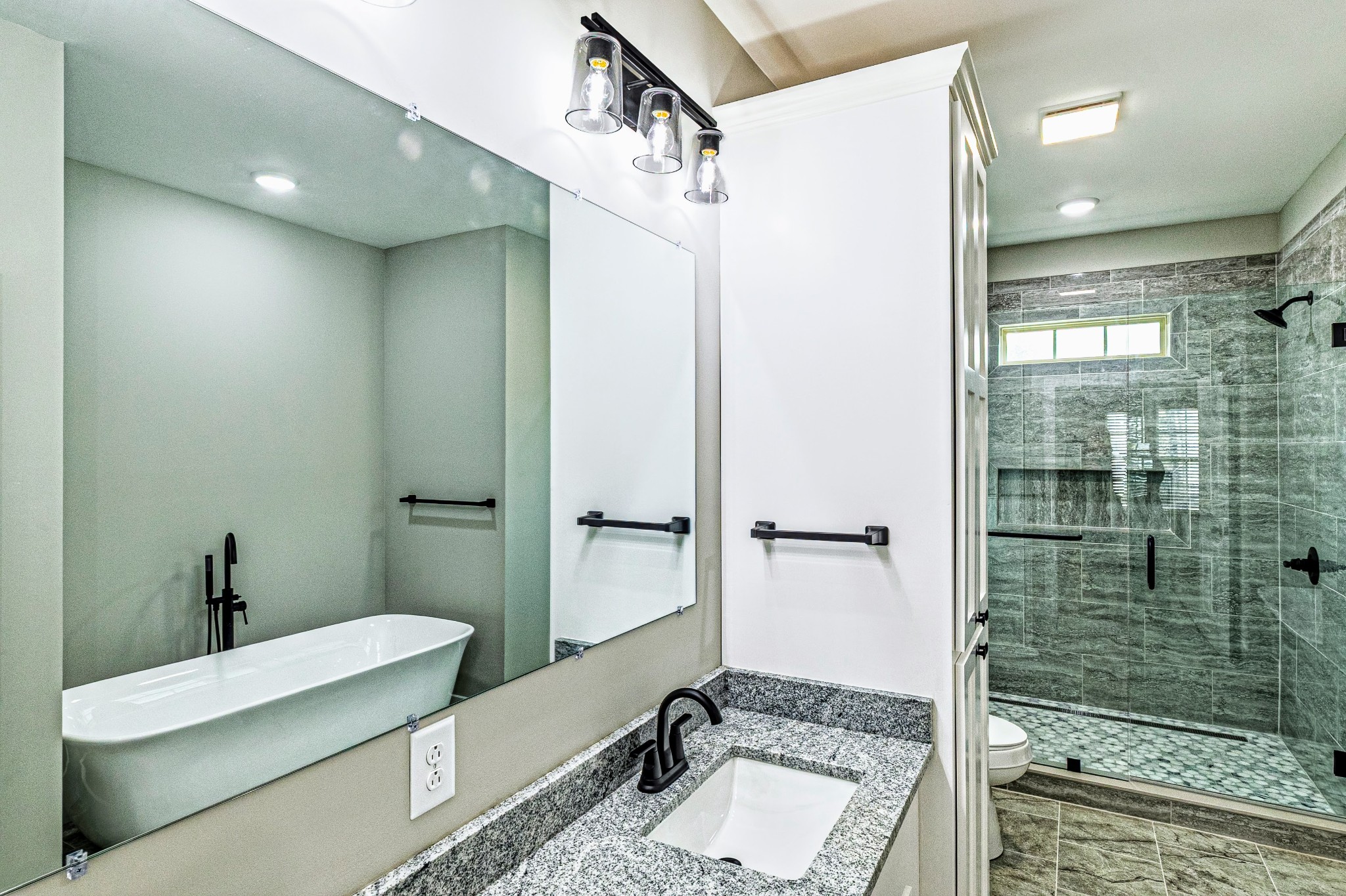 1875 Rocky Hollow Road Erin, TN 37061 - Photo 10 of 31 a bathroom with a granite countertop sink a mirror and shower