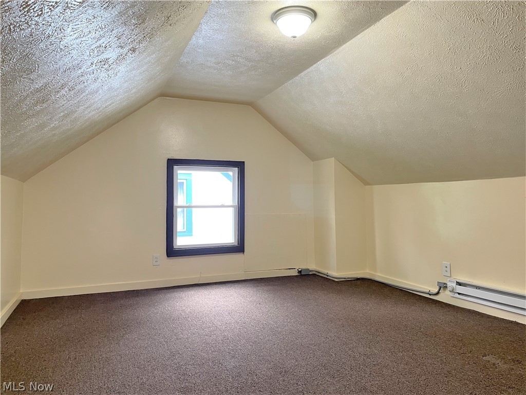 2104 Rossmoor Road Cleveland Heights, OH 44118 - Photo 19 of 35 Bedroom 4 on the 3rd floor with electric baseboard heat.