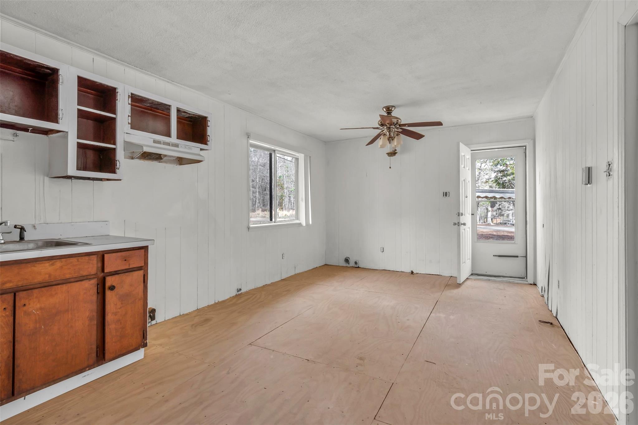 3489 State Rd S-29-582 Lancaster, SC 29720 - Photo 12 of 19 wooden floor in an empty room with a window