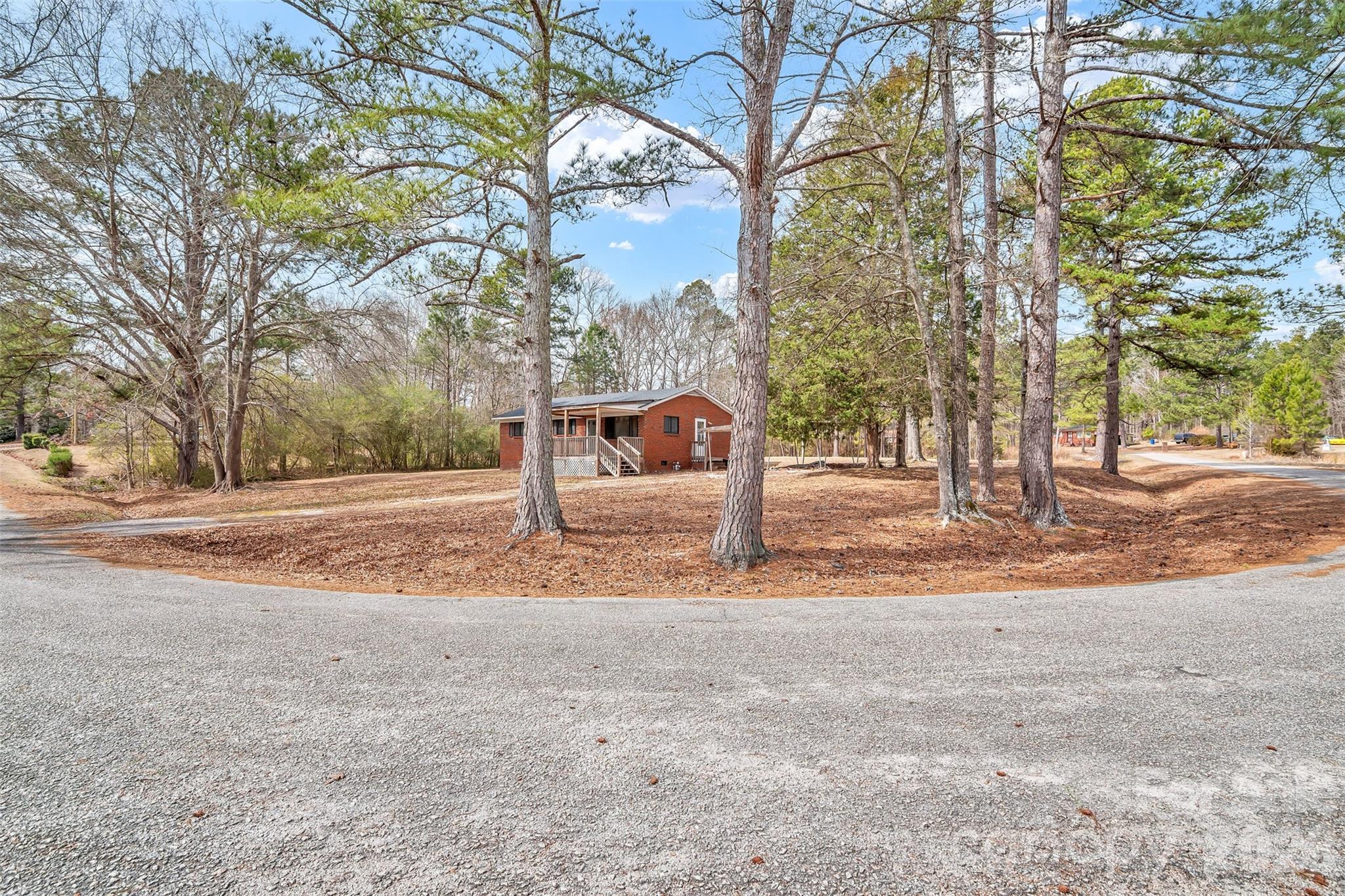 3489 State Rd S-29-582 Lancaster, SC 29720 - Photo 3 of 19 a view of road with large trees