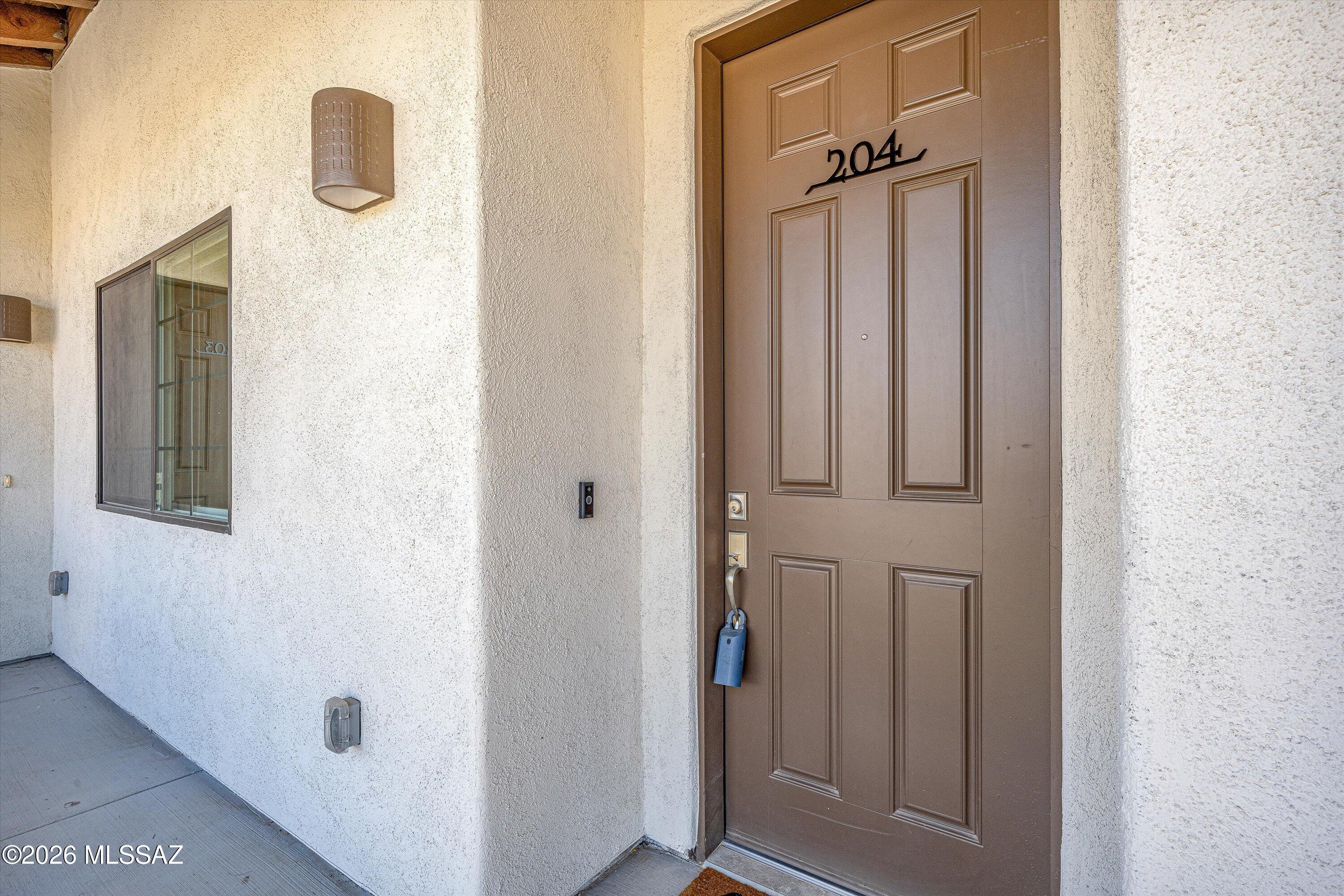 2042 East River Road, Unit 204 Tucson, AZ 85718 - Photo 6 of 28 05-Front Entrance
