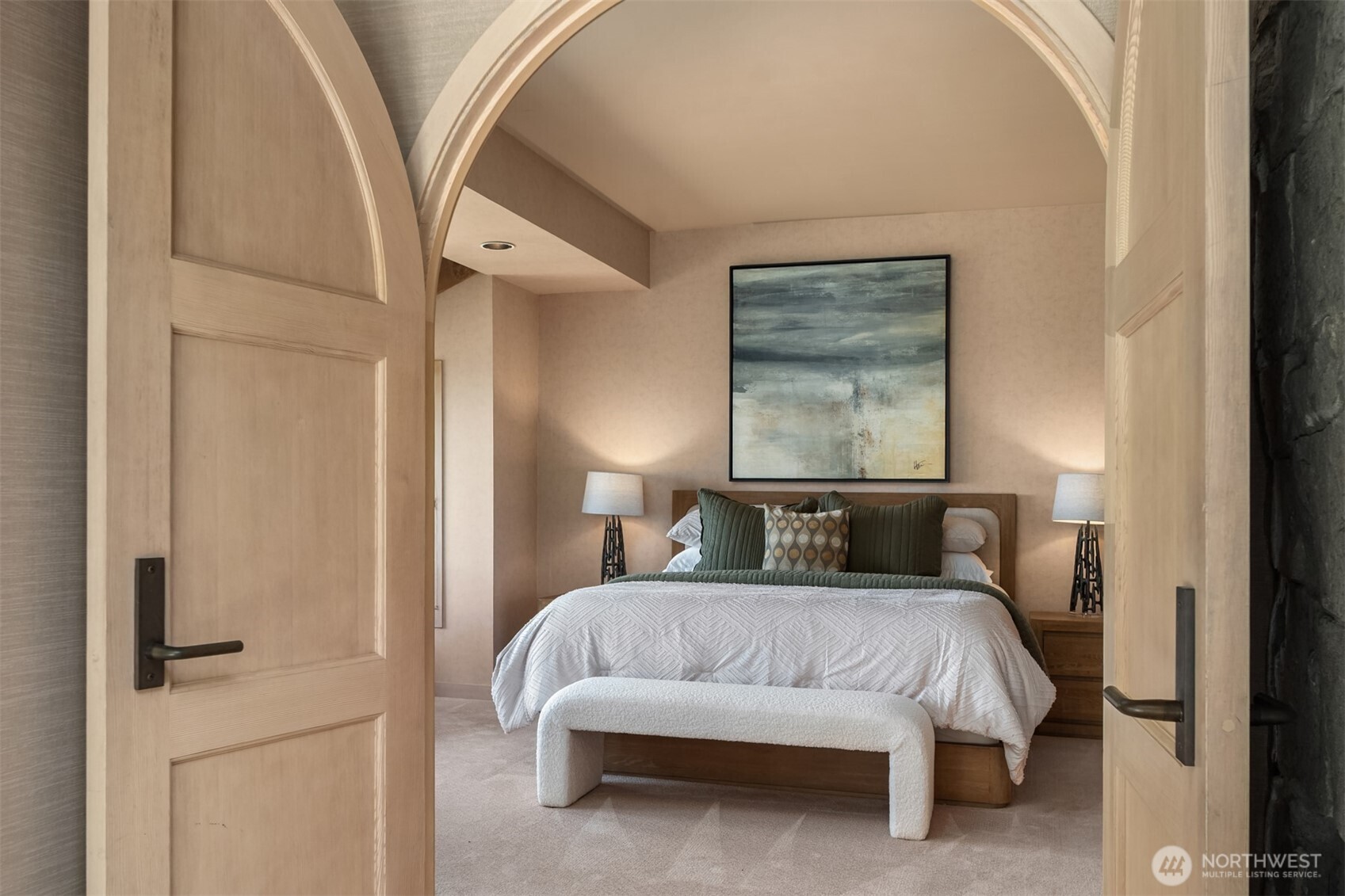 4065 East Sequim Bay Road, Unit 12 Sequim, WA 98382 - Photo 21 of 40 a bedroom with a bed and a painting on the wall