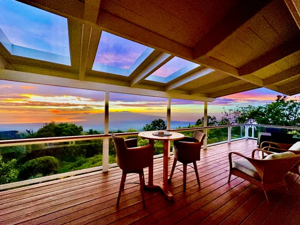 a view of a terrace with furniture