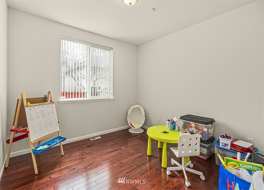 910 South 48th Street Renton, WA 98055 - Photo 12 of 30 a workspace with furniture and a window