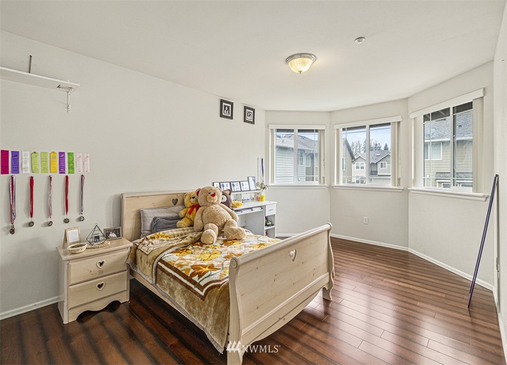 910 South 48th Street Renton, WA 98055 - Photo 14 of 30 a bed room with a bed and a window