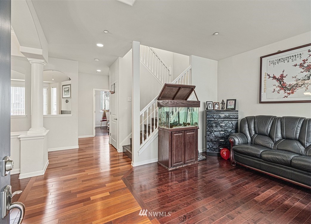 910 South 48th Street Renton, WA 98055 - Photo 3 of 30 a living room with furniture and a wooden floor