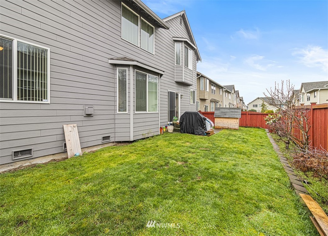 910 South 48th Street Renton, WA 98055 - Photo 27 of 30 a view of a house with a backyard