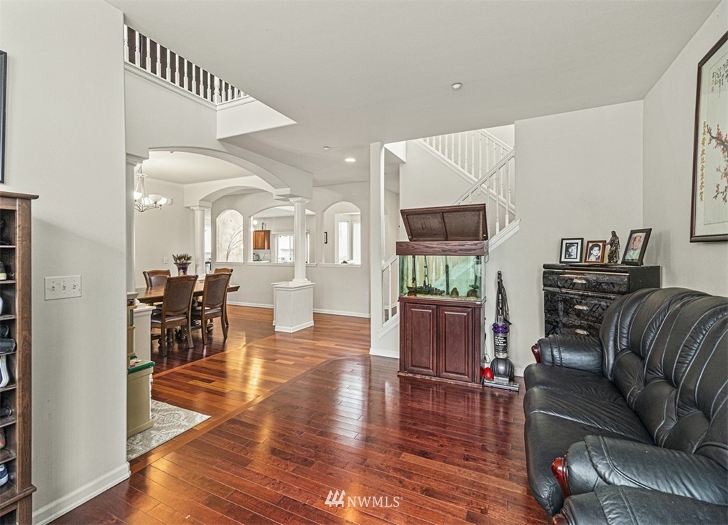 910 South 48th Street Renton, WA 98055 - Photo 4 of 30 a living room with furniture and wooden floor