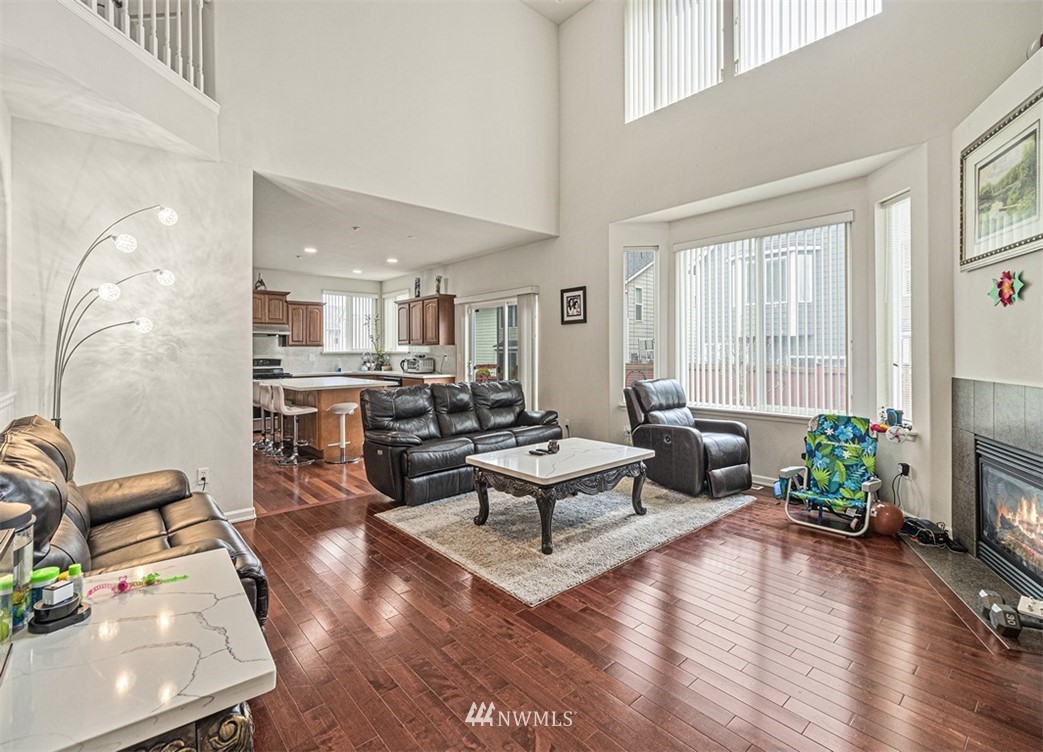 910 South 48th Street Renton, WA 98055 - Photo 6 of 30 a living room with furniture and a large window
