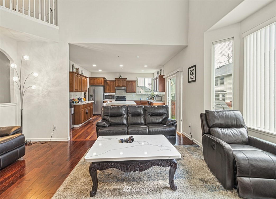 910 South 48th Street Renton, WA 98055 - Photo 7 of 30 a living room with furniture kitchen view and a window