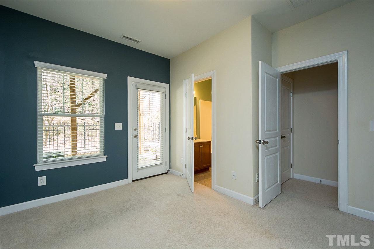 8016 Sycamore Hill Lane Raleigh, NC 27612 - Photo 15 of 19 an empty room with windows and closet
