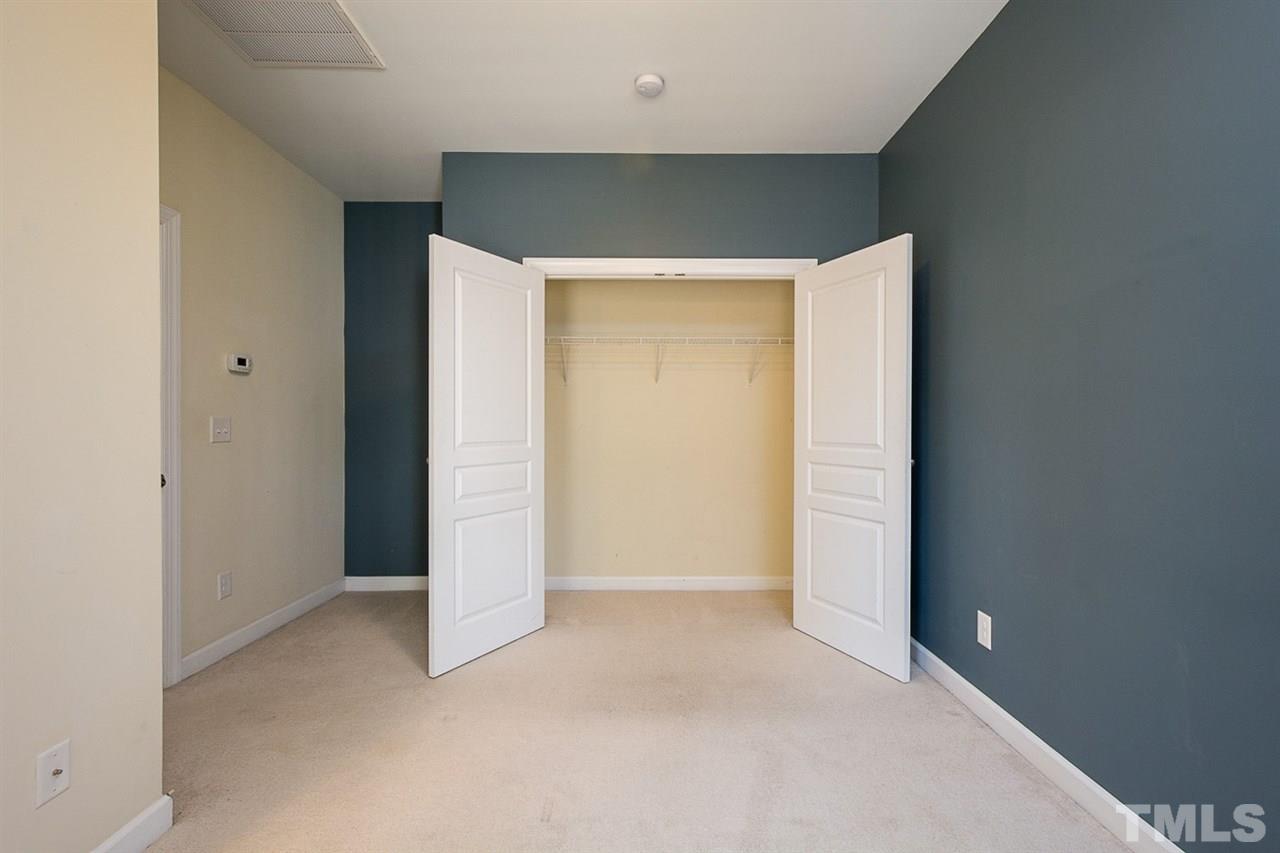 8016 Sycamore Hill Lane Raleigh, NC 27612 - Photo 16 of 19 an empty room with closet