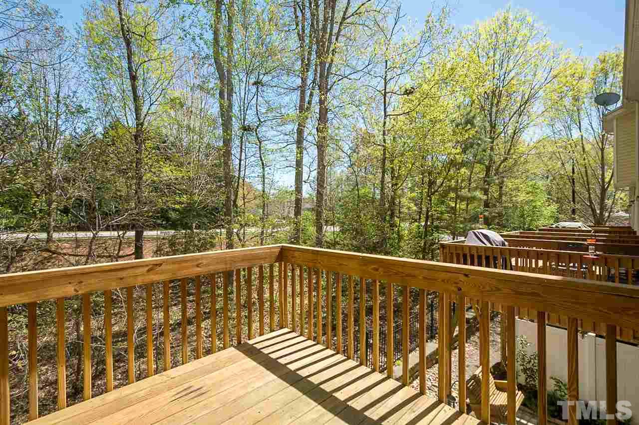 8016 Sycamore Hill Lane Raleigh, NC 27612 - Photo 18 of 19 a view of balcony with wooden floor and fence