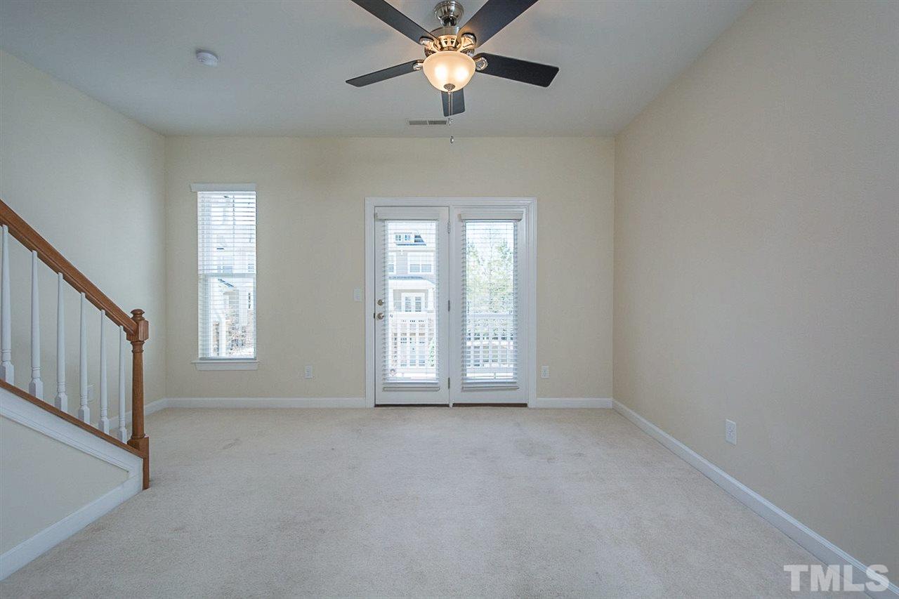 8016 Sycamore Hill Lane Raleigh, NC 27612 - Photo 6 of 19 a view of an empty room with a window