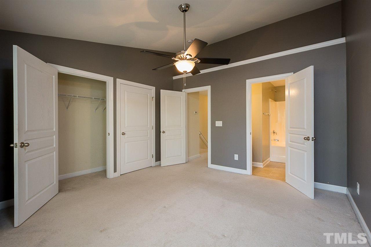 8016 Sycamore Hill Lane Raleigh, NC 27612 - Photo 9 of 19 a view of a chandelier fan and entryway