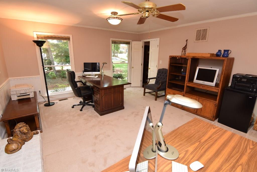 1902 Milan Road Greensboro, NC 27410 - Photo 14 of 30 Den also has floor to ceiling windows