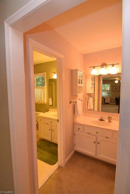 1902 Milan Road Greensboro, NC 27410 - Photo 17 of 30 Private master bath offers two vanity areas.