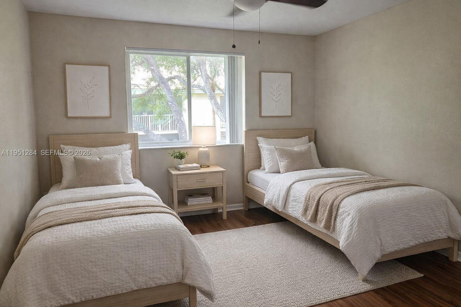 430 South Park Road, Unit 3303 Hollywood, FL 33021 - Photo 5 of 12 a bedroom with bed and a window