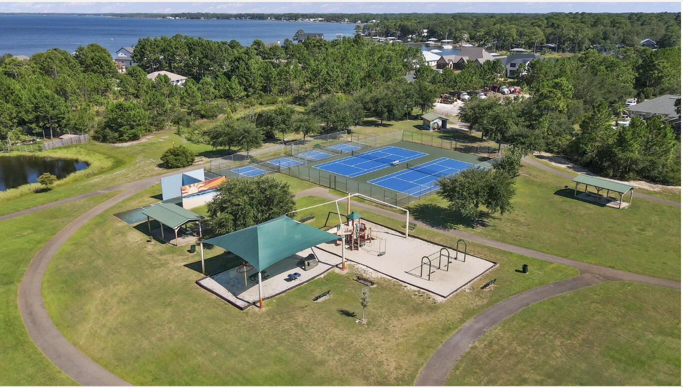 268 Loblolly Bay Drive Santa Rosa Beach, FL 32459 - Photo 69 of 73 an aerial view of a house with a yard basket ball court and outdoor seating