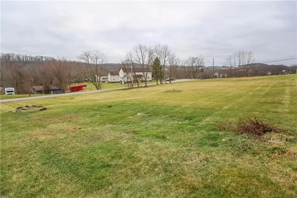 a view of a lake with a big yard