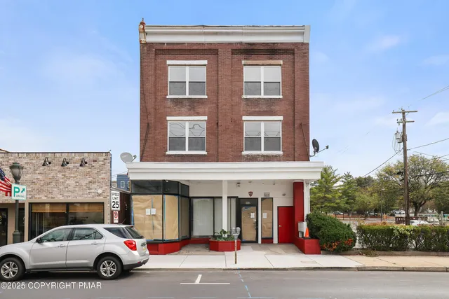 a car parked in front of a building