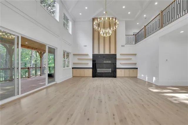 a kitchen with stainless steel appliances a stove microwave and cabinets
