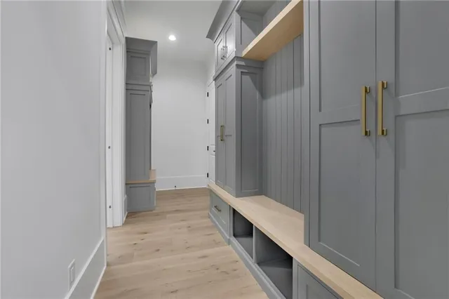 a view of a patio with a table and chairs next to a yard