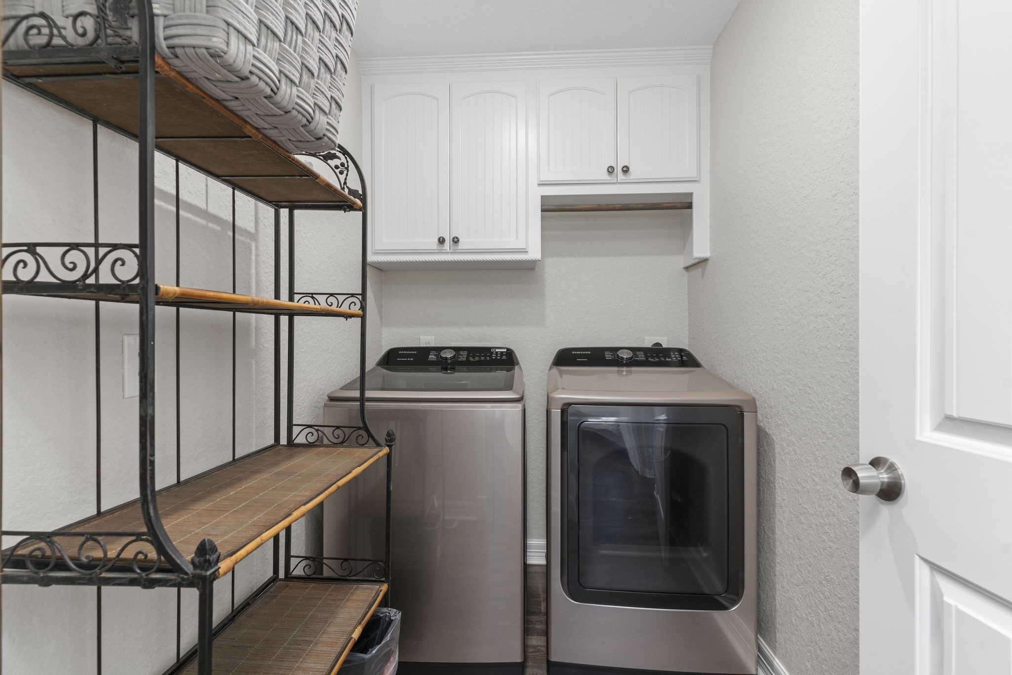 203 Sandpebble Place Surfside Beach, TX 77541 - Photo 17 of 27 a utility room with dryer and washer