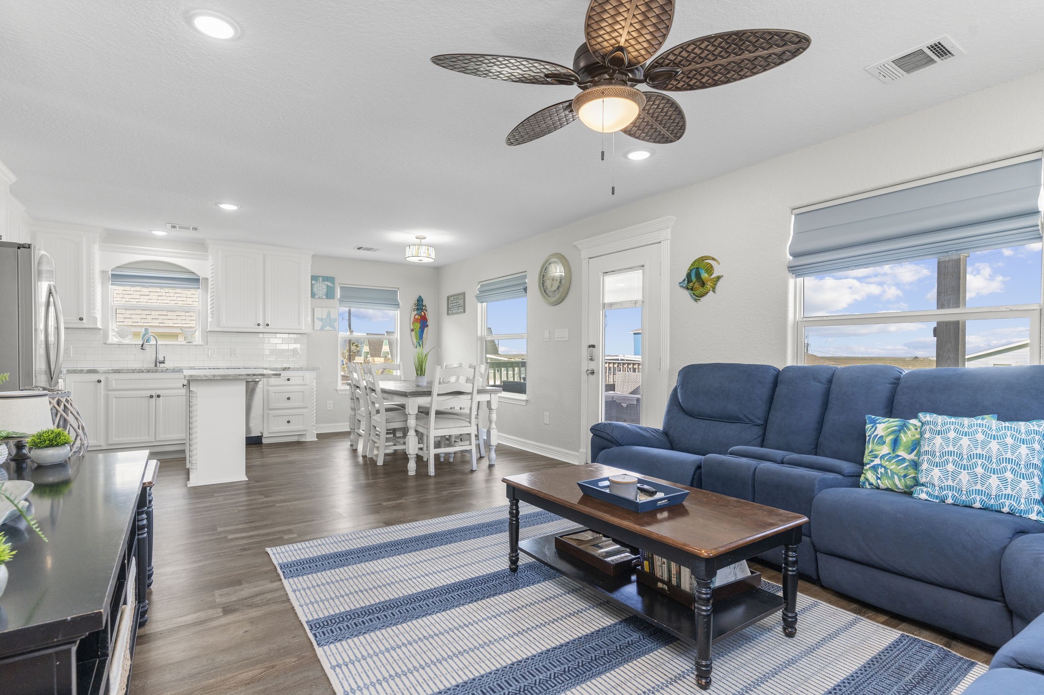 203 Sandpebble Place Surfside Beach, TX 77541 - Photo 4 of 27 a living room with furniture kitchen view and a table