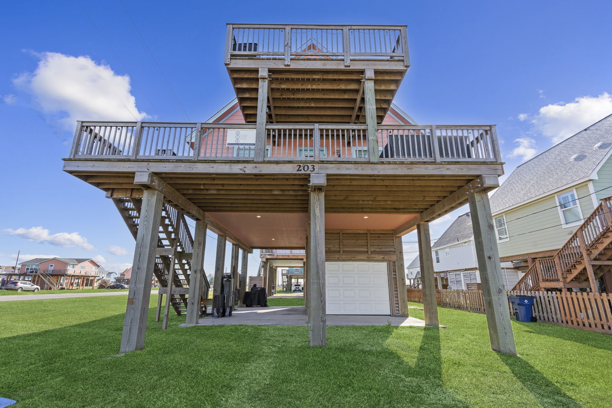 203 Sandpebble Place Surfside Beach, TX 77541 - Photo 7 of 27 a view of a house with a yard