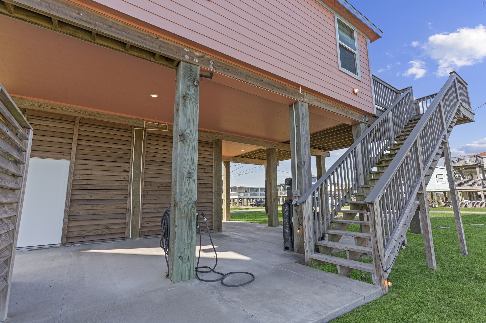 203 Sandpebble Place Surfside Beach, TX 77541 - Photo 8 of 27 a view of outdoor space and deck