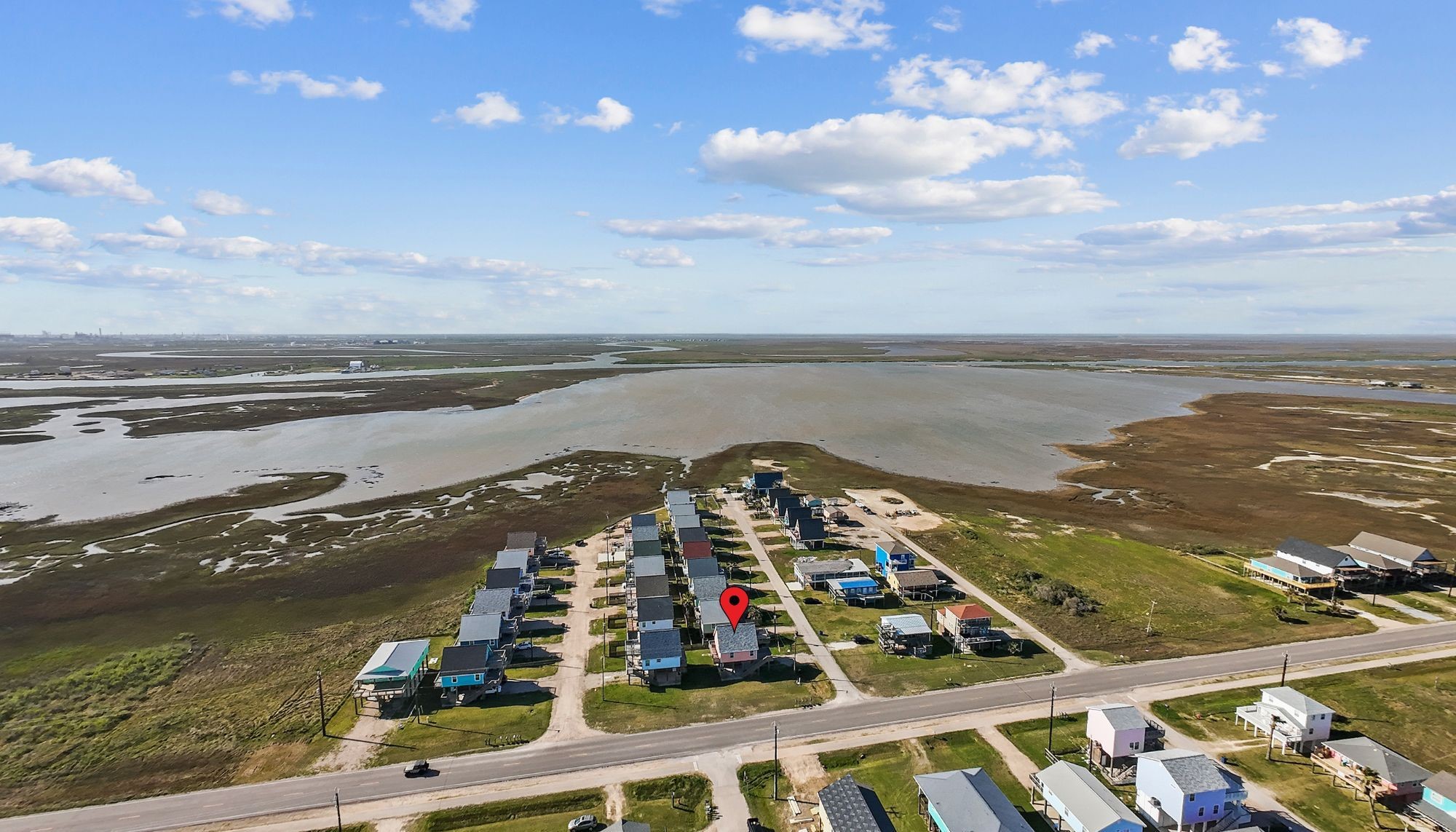 203 Sandpebble Place Surfside Beach, TX 77541 - Photo 10 of 27 a view of a city and an ocean view