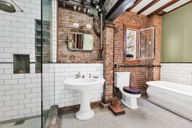 a view of livingroom with furniture and fireplace
