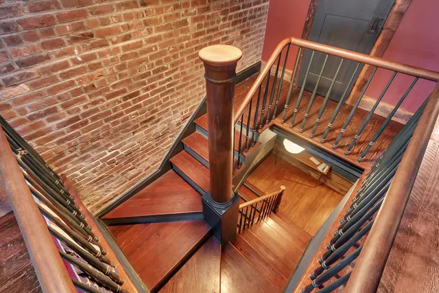 a view of livingroom with furniture and a fireplace