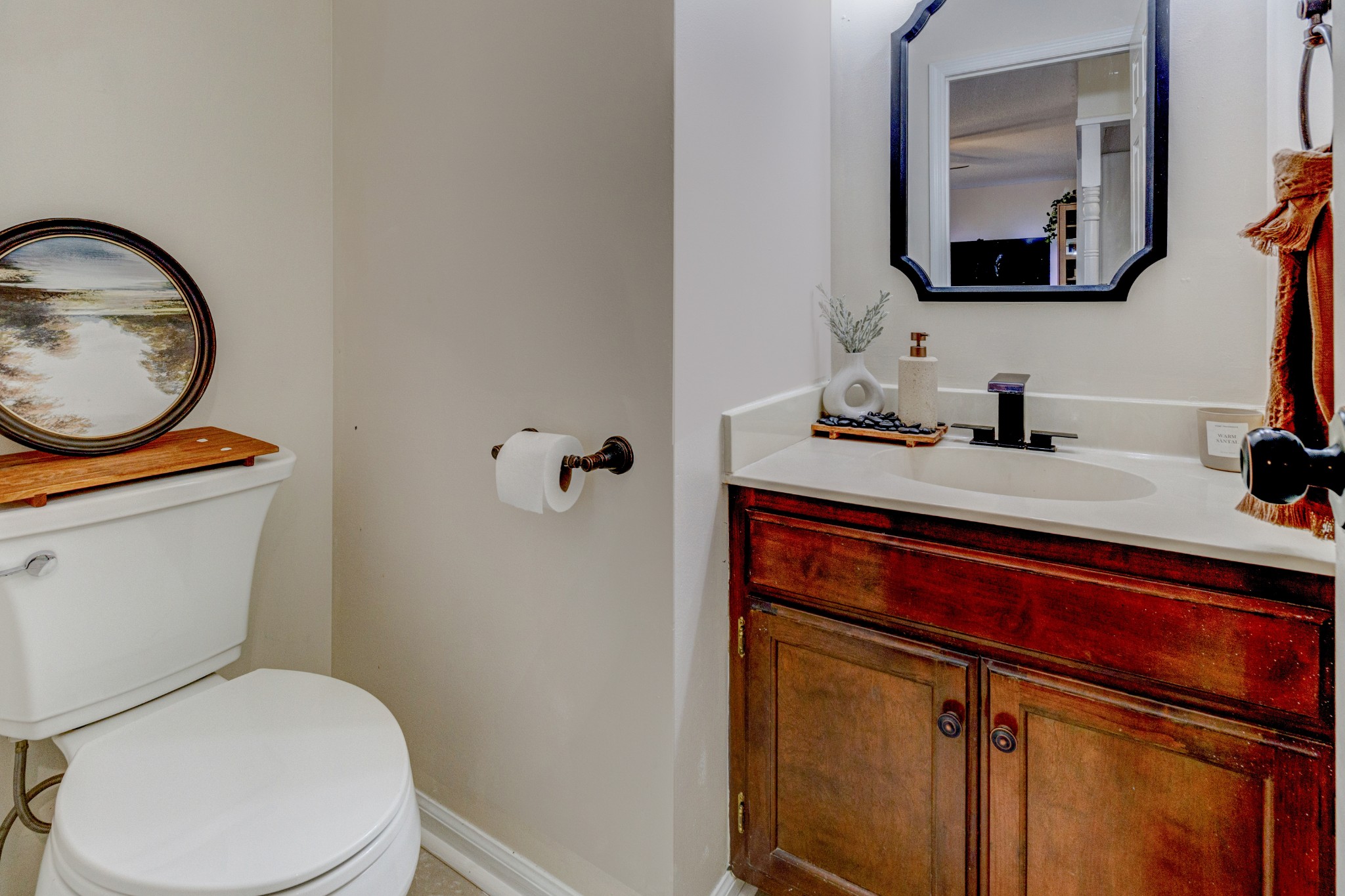 88 Chapel Road Tullahoma, TN 37388 - Photo 12 of 27 a bathroom with a toilet a sink and mirror