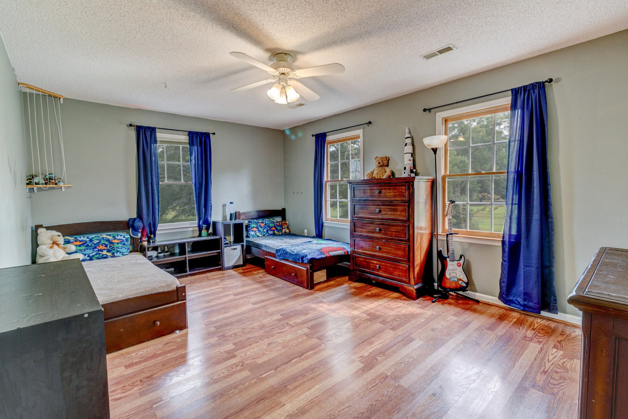 88 Chapel Road Tullahoma, TN 37388 - Photo 13 of 27 a living room with furniture and a wooden floor