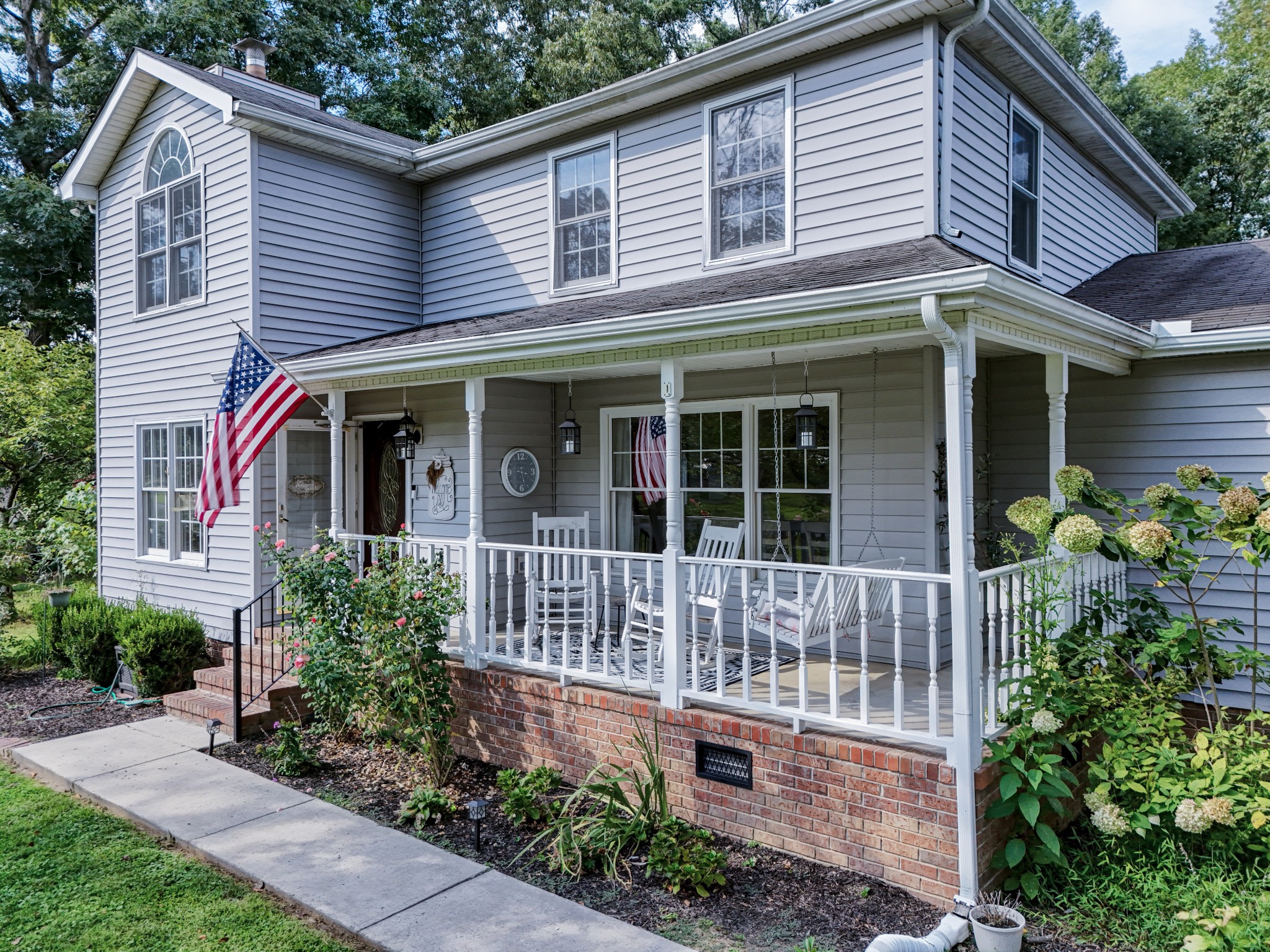 88 Chapel Road Tullahoma, TN 37388 - Photo 25 of 27 a front view of a house with plants and garden